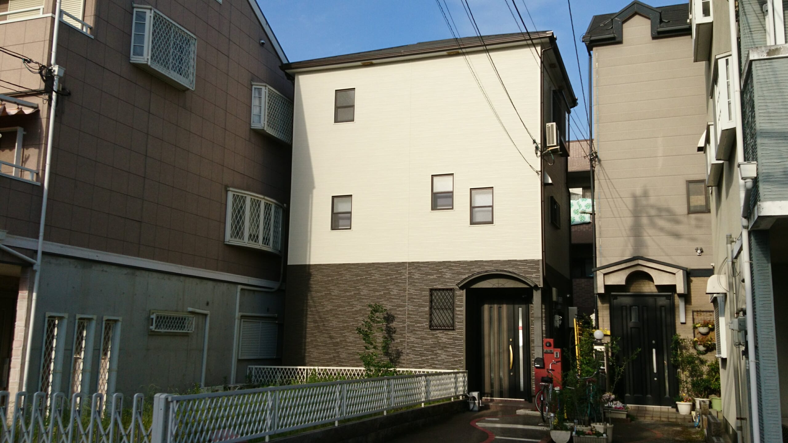 大阪市淀川区 金属サイディングと金属屋根でカバー工法